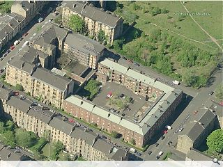 Courtyard flats to complete 1930s fire-station 