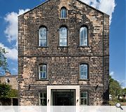 A new sandstone doorway has been built into the historic facade