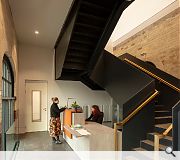 The new entrnace opens to an accessible lift and feature staircase