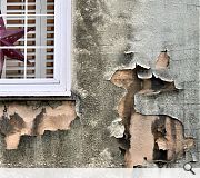 Peeling stonework is an early sign of a building in distress