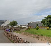 The site offers elevated views across the Firth of Clyde to Arran