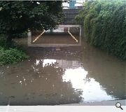 Commuters forgetting to pack a canoe would have been stymmied by this watery obstacle