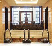 The art deco foyer serves as a grand entrance space for the complex complex